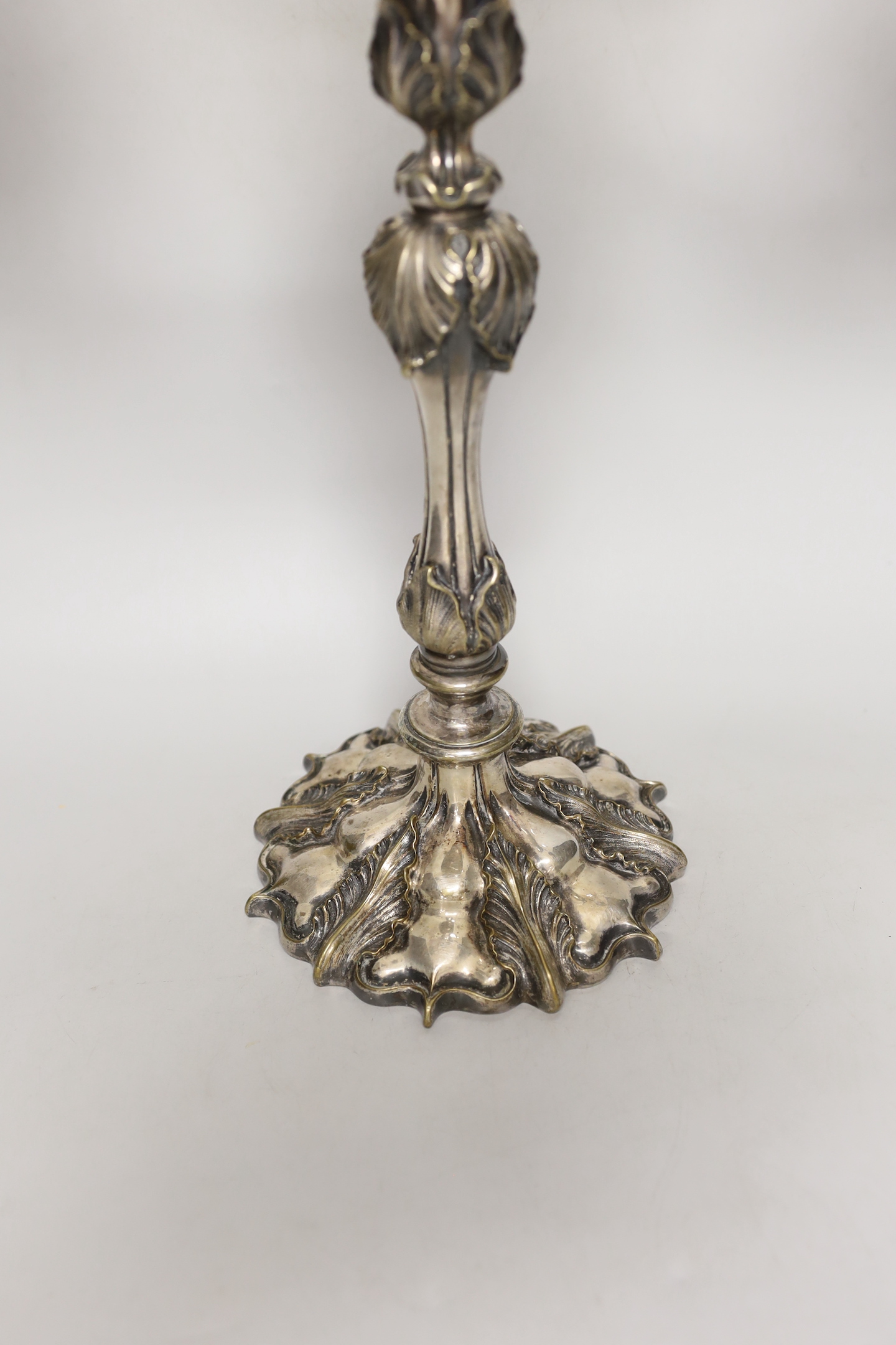 A Victorian plated Elkington & Co two branch, three light candelabrum, 60cm high